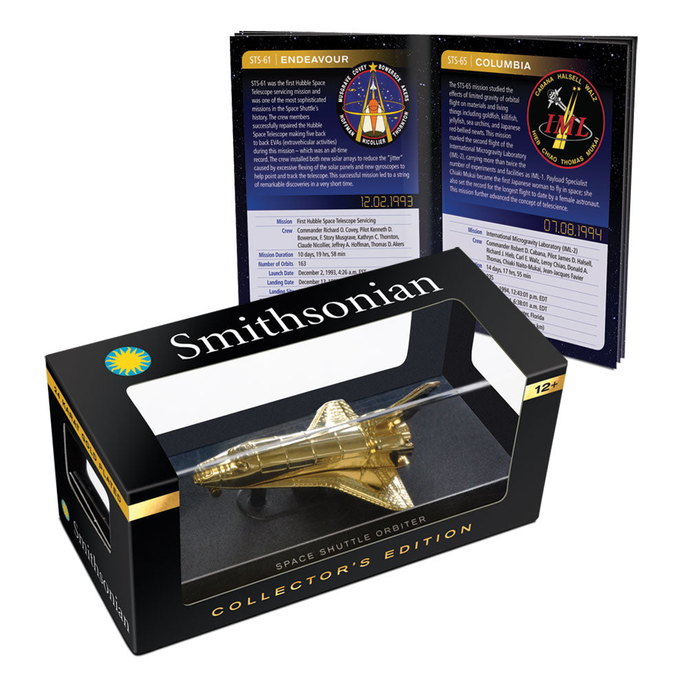 6 Inch Collectors Edition 24 Karat Gold Plated Replica Model of the NASA Space Shuttle Orbiter (Enterprise, Columbia, Challenger, Discovery, Atlantis & Endeavour) mounted on a Display Stand in a Collectors Case featuring a 12 Color Space Missions Booklet. InAir Smithsonian