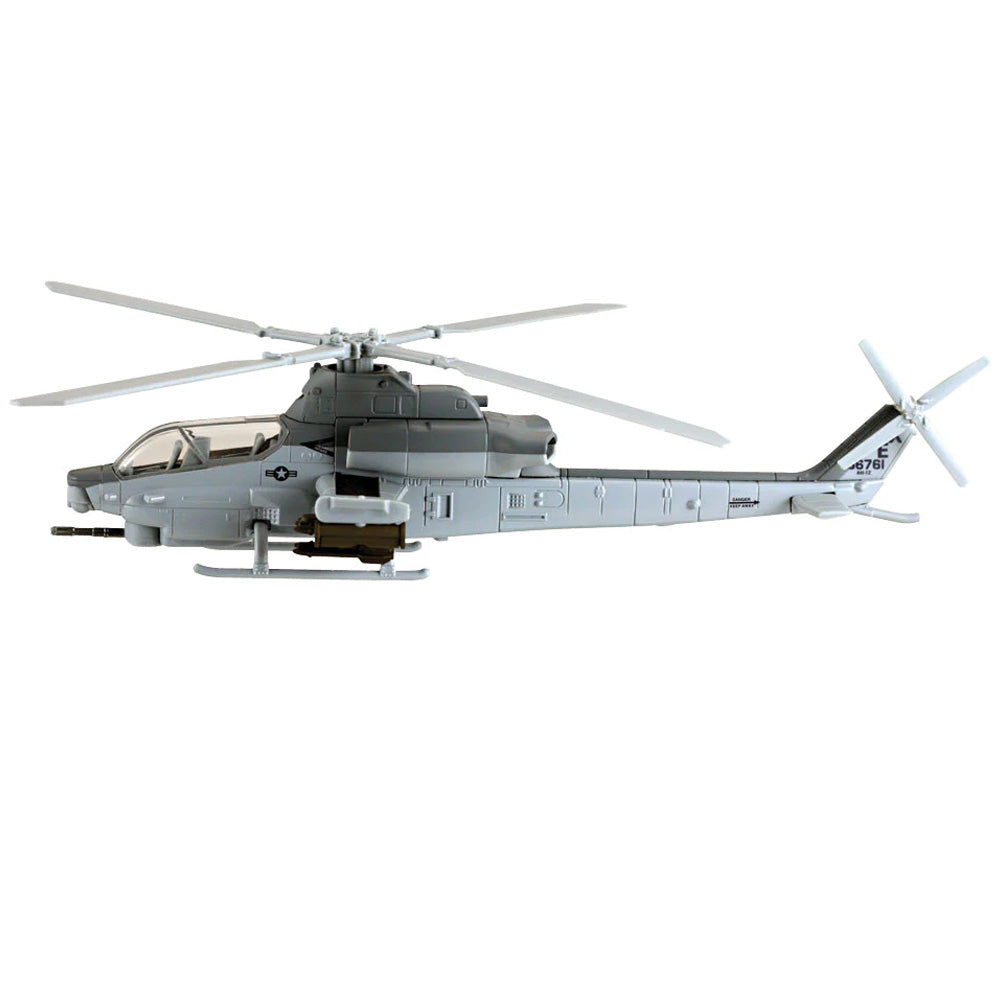 This 1:55 scale die-cast metal Bell AH-1Z Cobra helicopter measures 10.5 inches long and includes display stand. Limited Edition replica is individually serial numbered.  Diecast metal and plastic Includes display stand Doors open and propeller spins 10.5 inches long 1:55 scale
