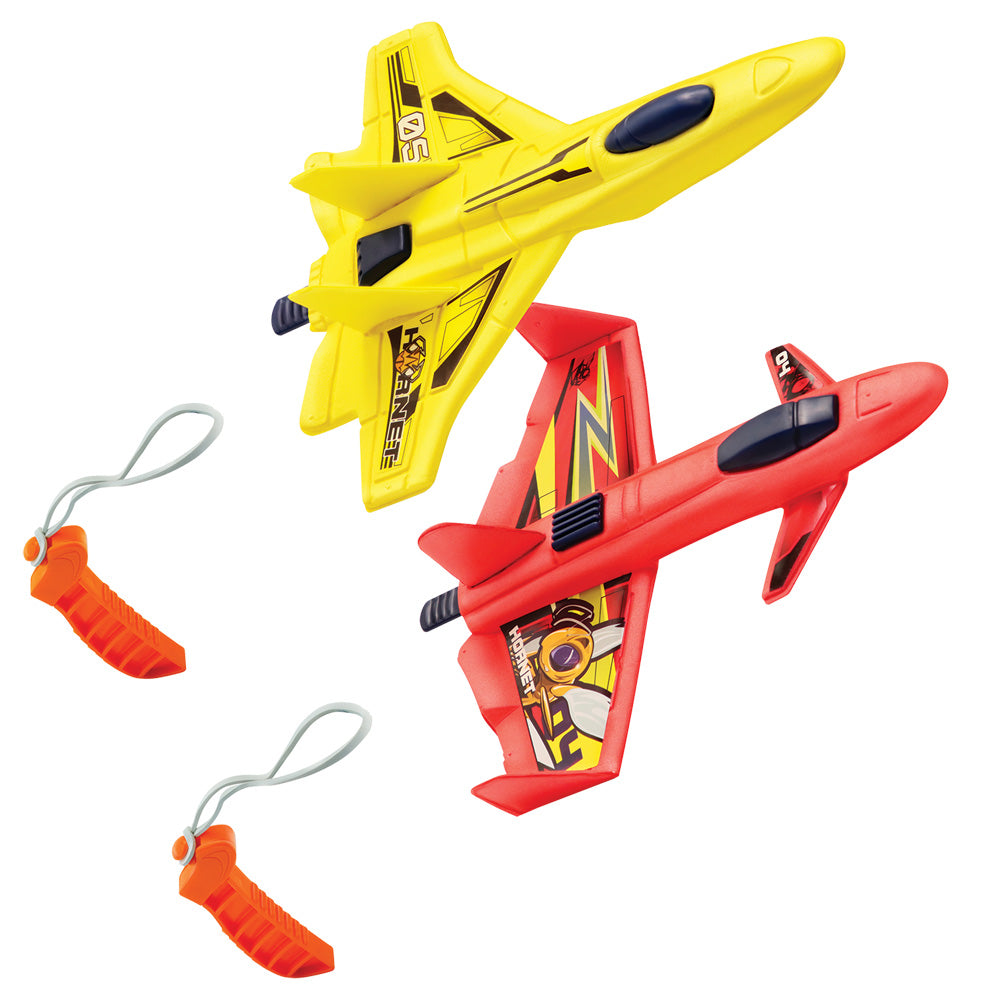 Stunt Flyer Hornet Storm Jet Made from soft, lightweight, aerodynamic foam, these stunt flyers resemble airshow jets and fly up to 40 feet!  Ages 4+ Two Assorted Styles Material: Foam Flying Toys Lanard Toys